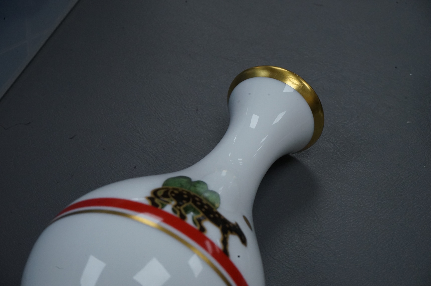 La Maison de Louis Cartier, Limoges ‘Panther’ vase. Stamped on base, 17.5cm high.